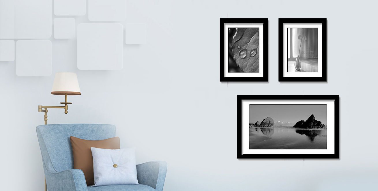 Black picture frames displayed in a contemporary interior