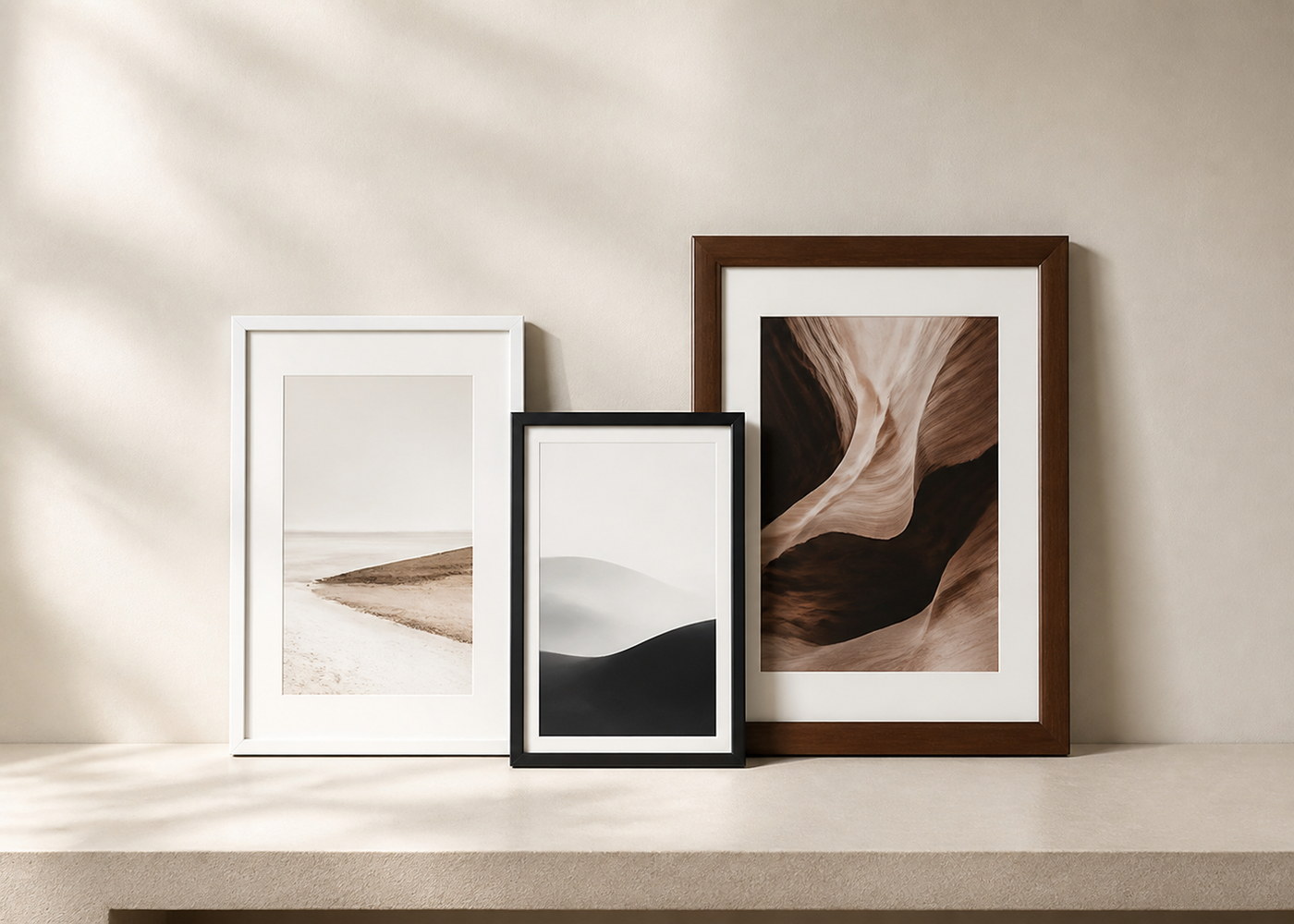 Photo frames and poster frames displayed in a warm contemporary interior